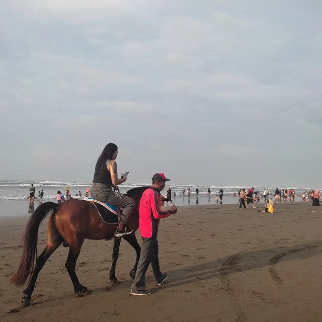 Naik Kuda atau Delman